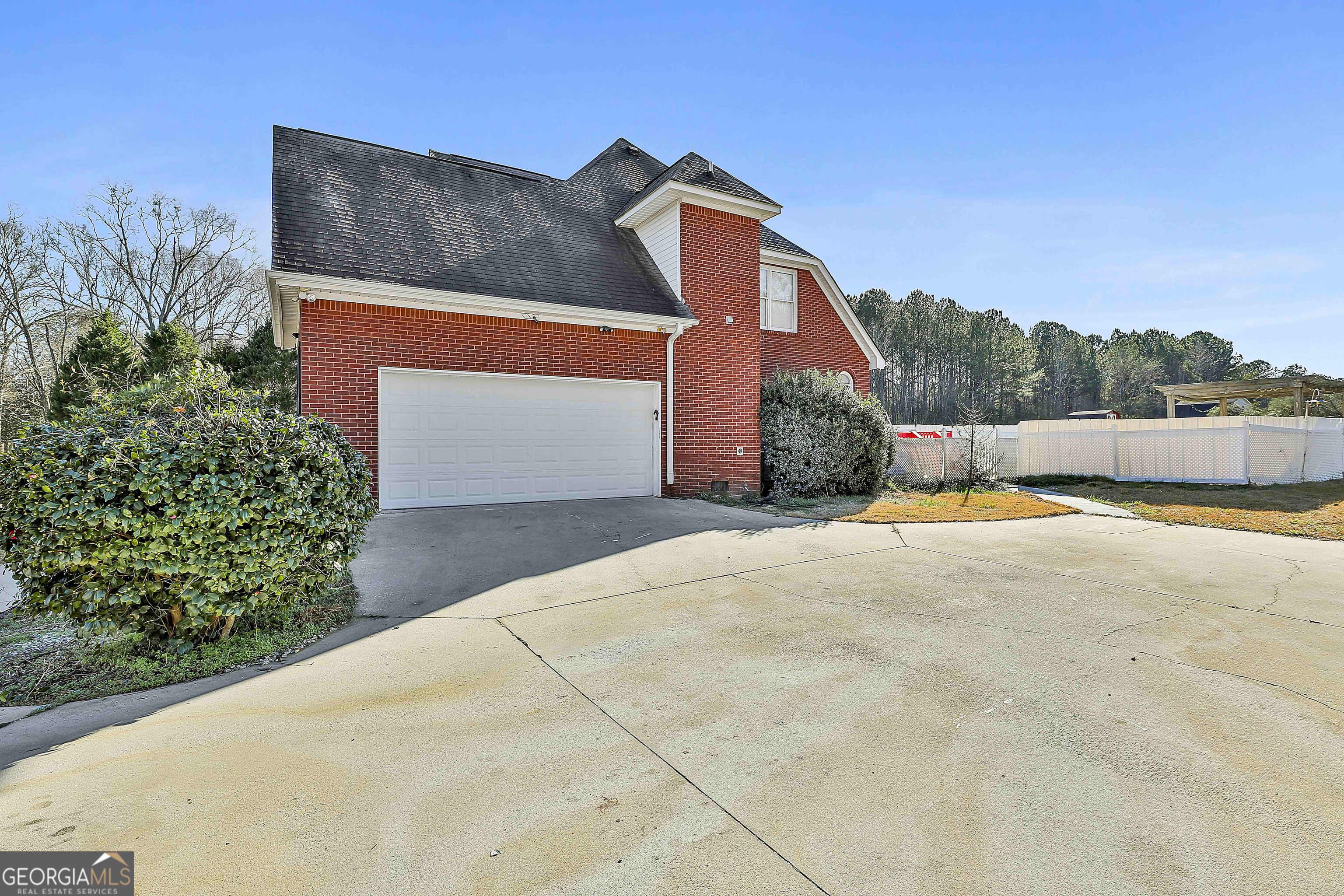 1317 Cheatham Road Griffin, GA 30223 - Photo 7 of 41 a front view of a house with a yard