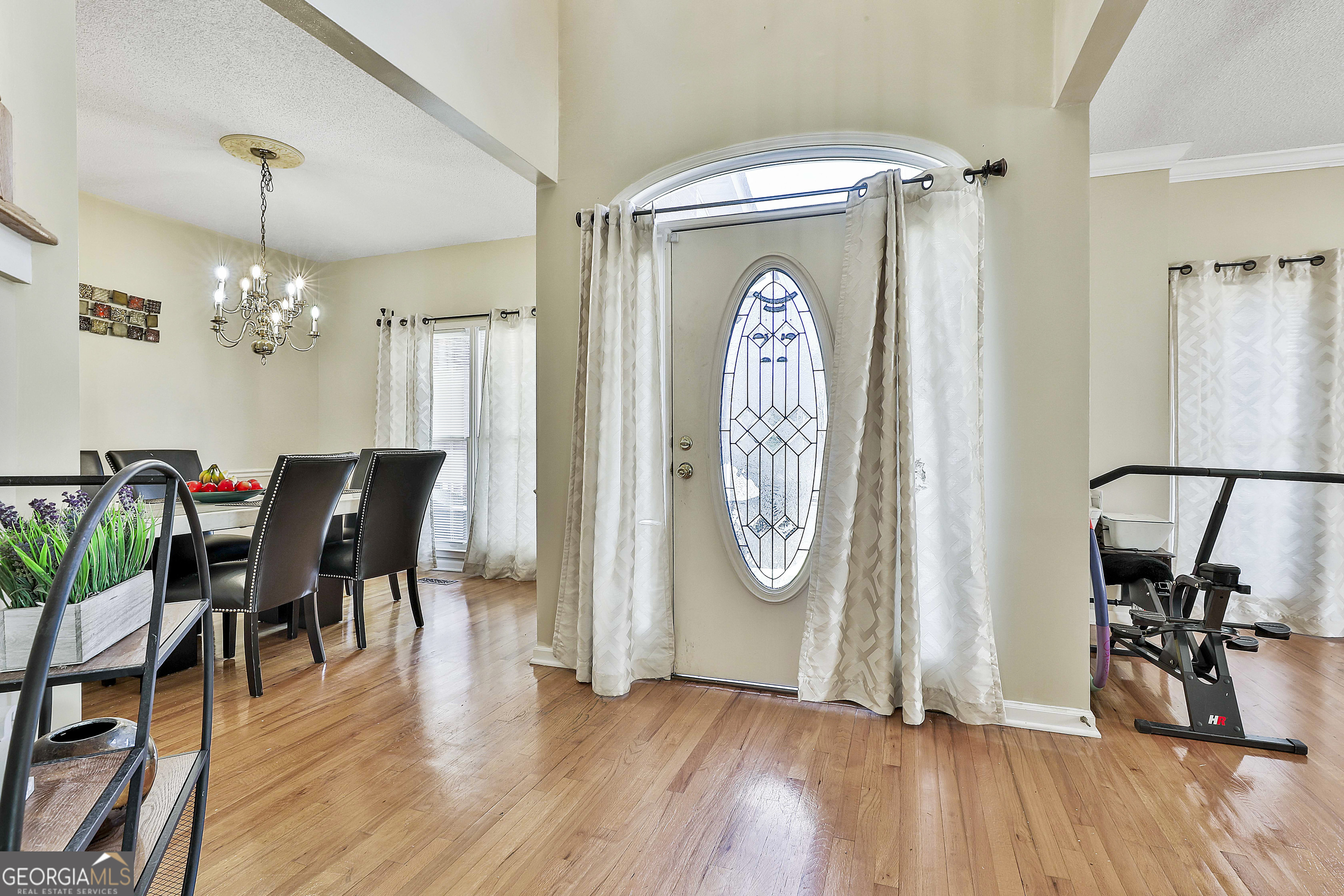 1317 Cheatham Road Griffin, GA 30223 - Photo 9 of 41 a view of a room with furniture and wooden floor