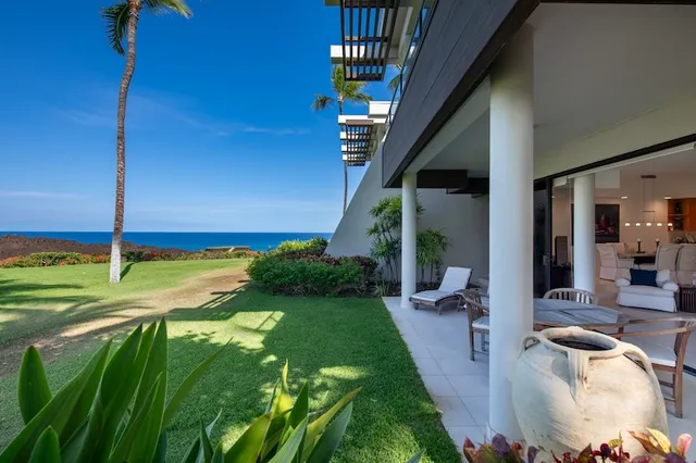 a view of yard from a corridor