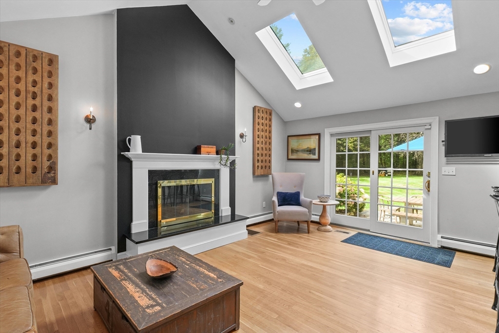 7 Kimball Road Boxford, MA 01921 - Photo 12 of 41 a living room with furniture and a fireplace