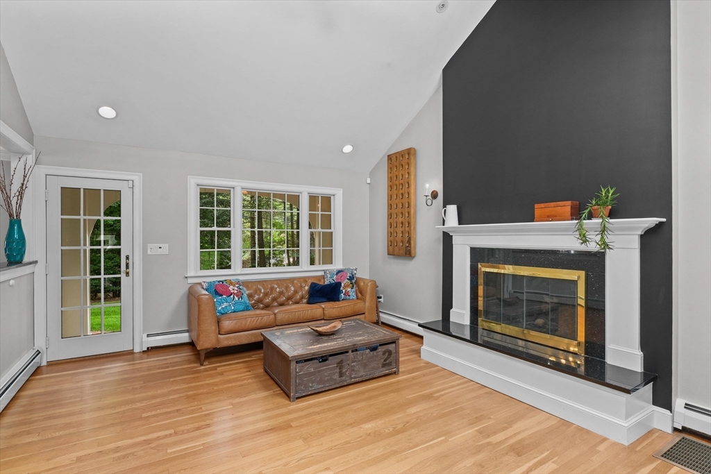7 Kimball Road Boxford, MA 01921 - Photo 13 of 41 a living room with furniture and a fireplace