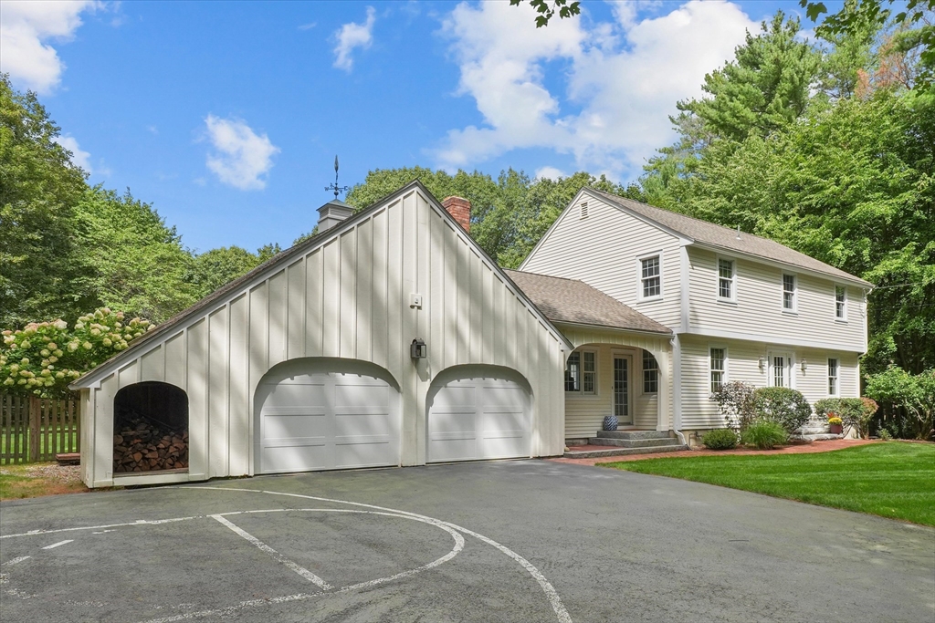 7 Kimball Road Boxford, MA 01921 - Photo 2 of 41 a front view of a house with garden