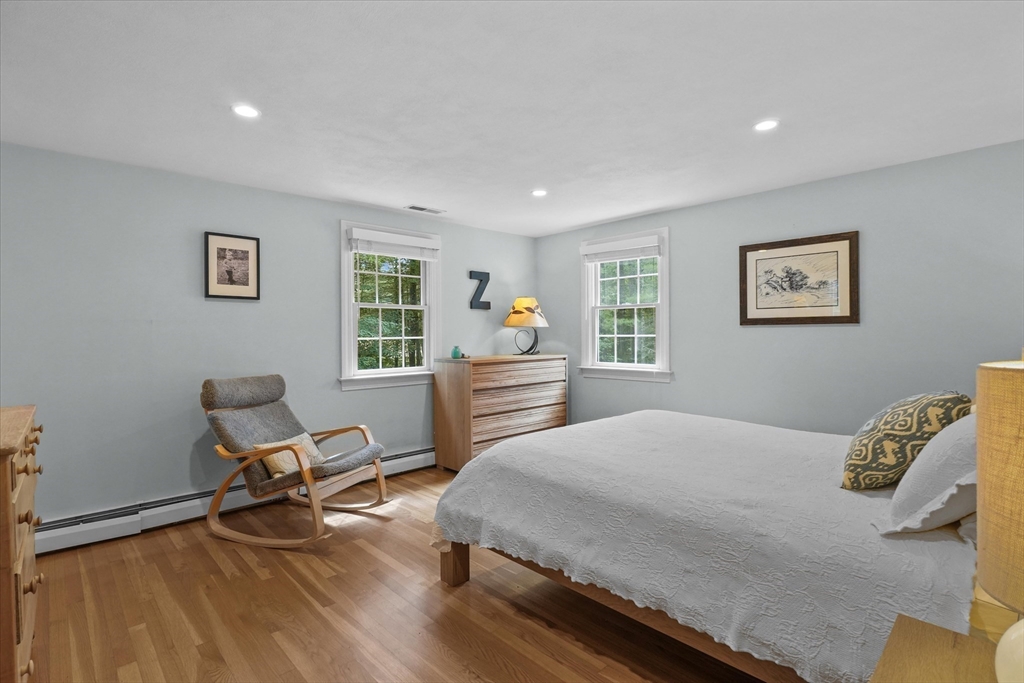 7 Kimball Road Boxford, MA 01921 - Photo 21 of 41 a bedroom with a bed and wooden floor