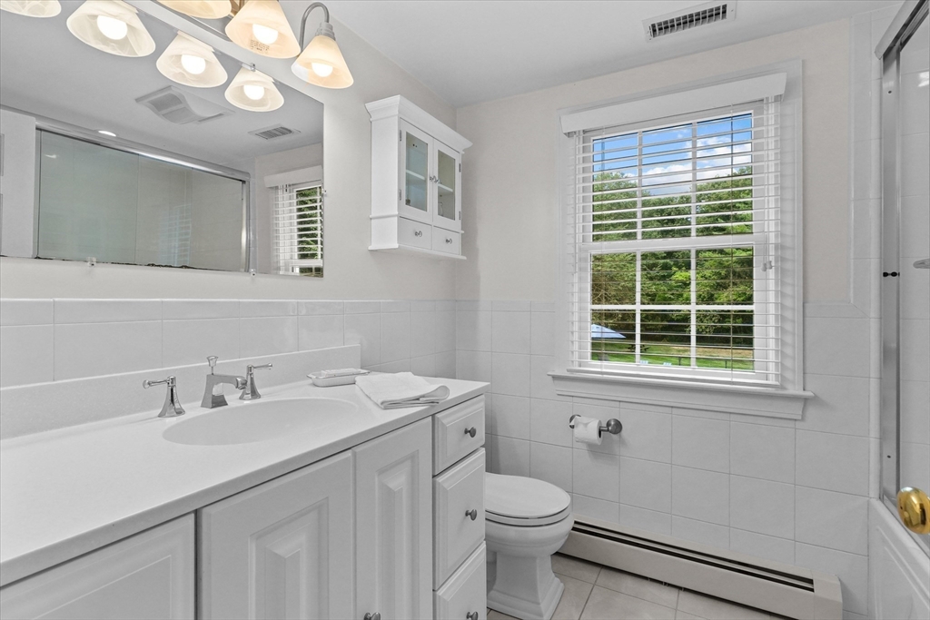 7 Kimball Road Boxford, MA 01921 - Photo 27 of 41 a bathroom with a sink a mirror and a toilet