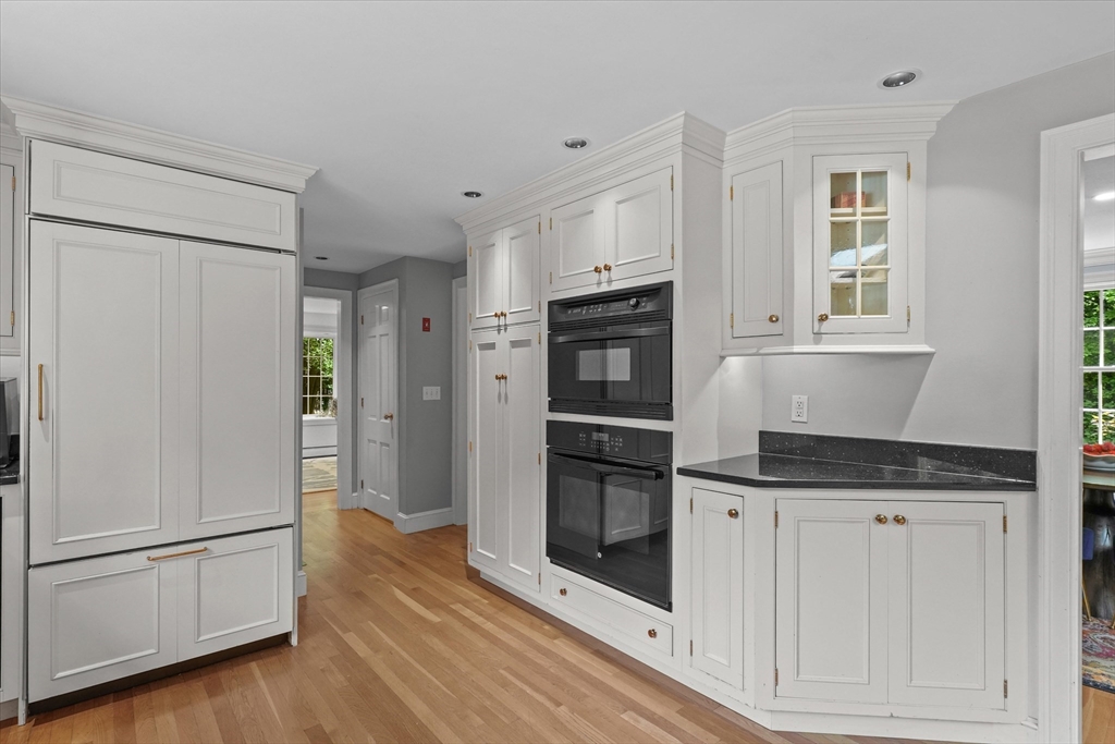 7 Kimball Road Boxford, MA 01921 - Photo 9 of 41 a kitchen with granite countertop a refrigerator and a stove top oven