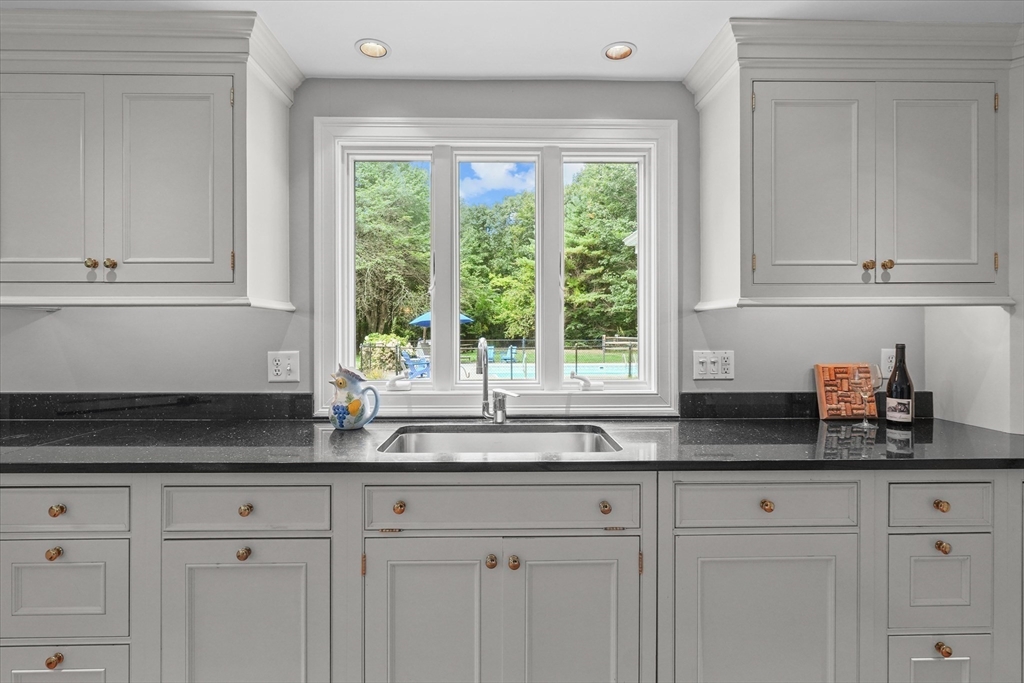 7 Kimball Road Boxford, MA 01921 - Photo 10 of 41 a kitchen with granite countertop white cabinets and a window
