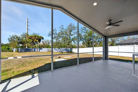 a backyard of a house with lots of green space
