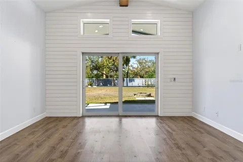 a large kitchen with stainless steel appliances lots of counter space sink and cabinets