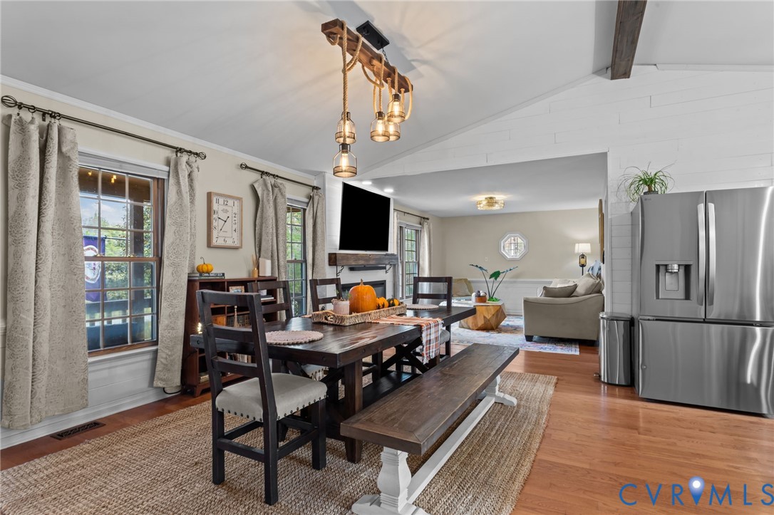 1201 Mt Hermon Road Midlothian, VA 23112 - Photo 6 of 48 Dining space with wood finished floors and a firep