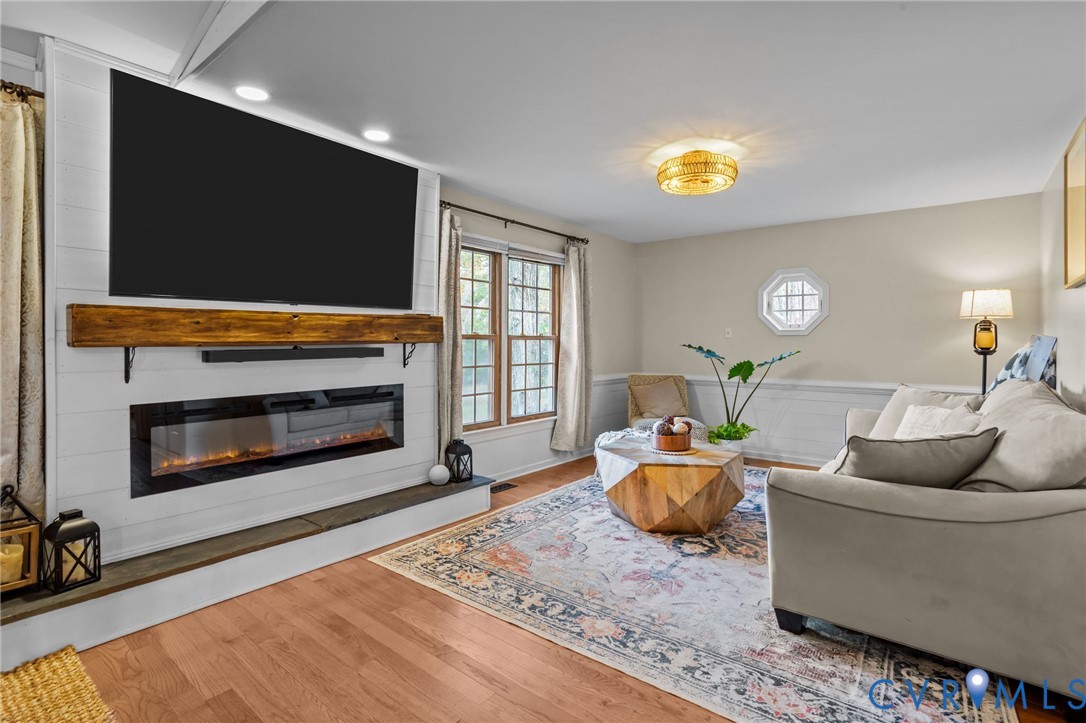 1201 Mt Hermon Road Midlothian, VA 23112 - Photo 10 of 48 Living room featuring light wood-style floors, a l
