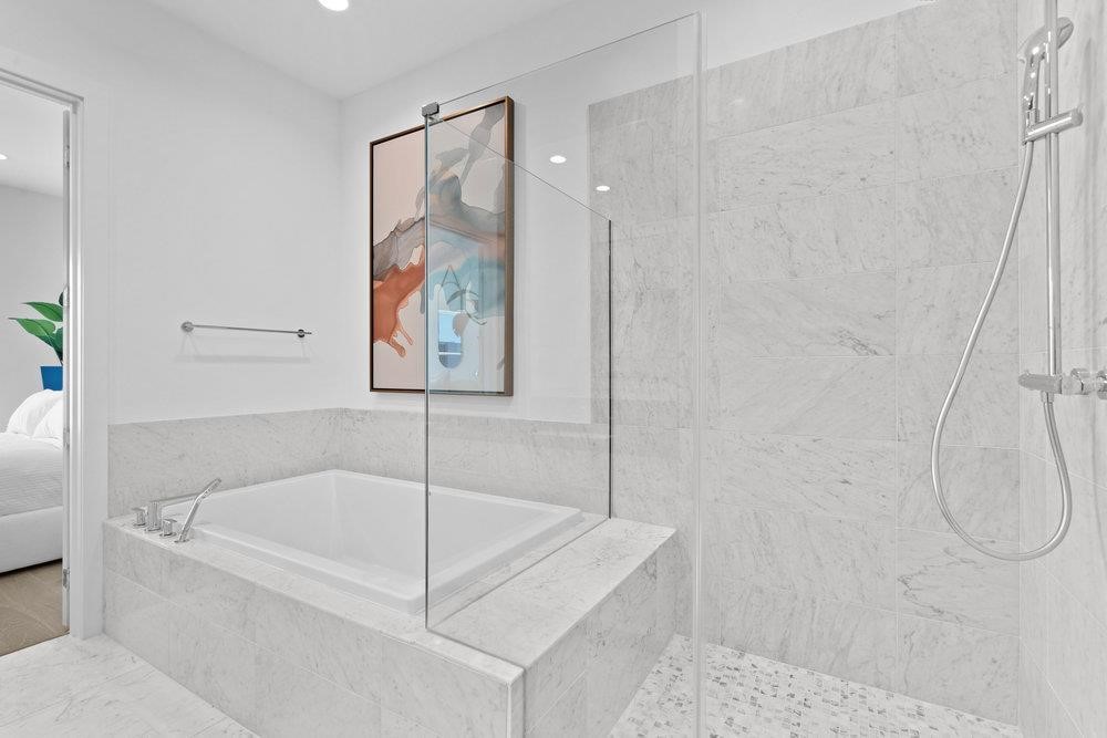 2805 McCurdy Street, Unit 7 Austin, TX 78723 - Photo 20 of 40 a bathroom with a bathtub and a shower