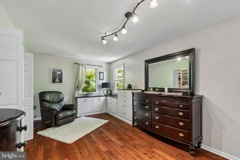 a view of a livingroom with furniture and window