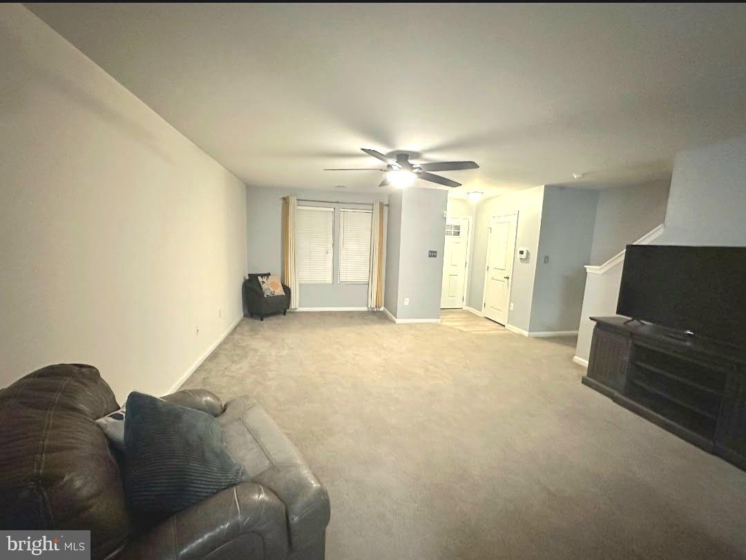 330 Nob Hill Road Dover, DE 19901 - Photo 2 of 12 a living room with furniture and a flat screen tv