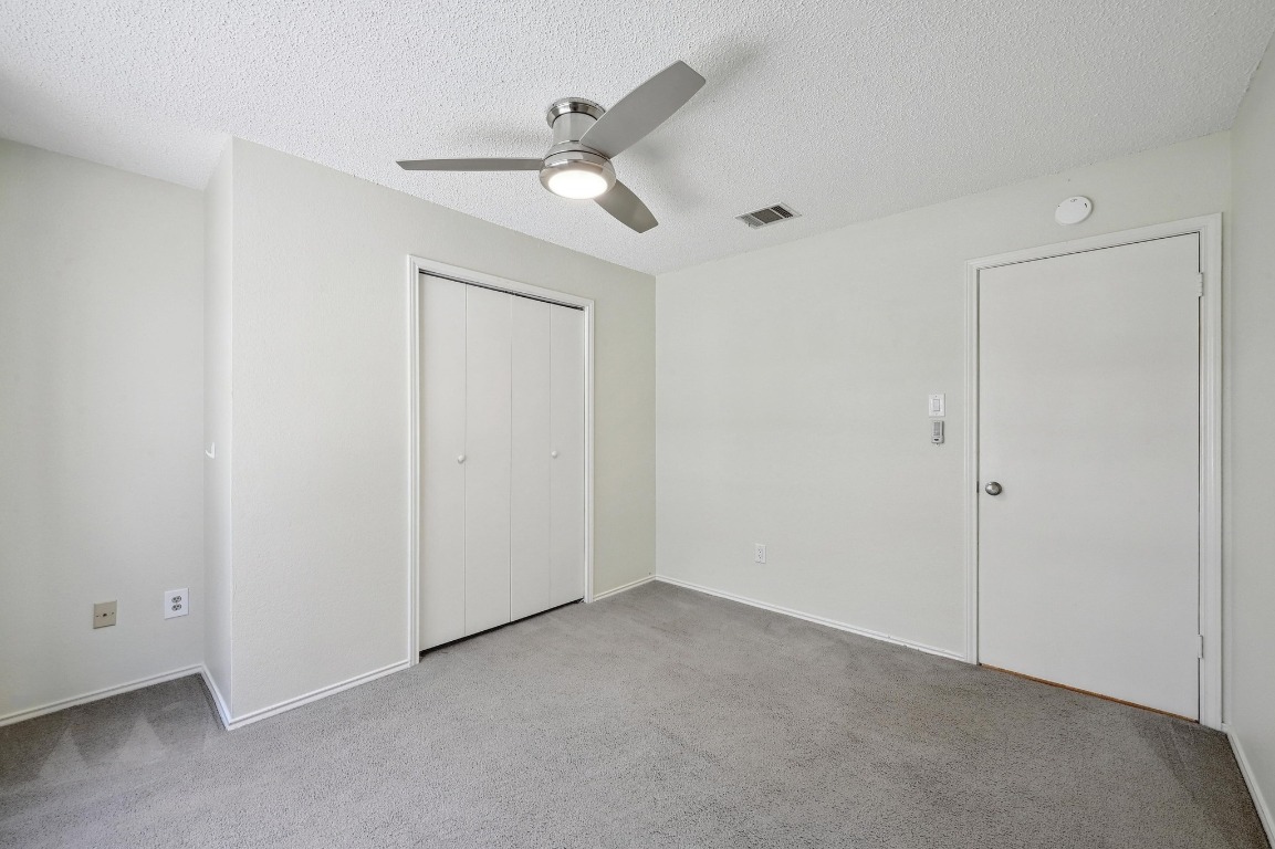 7201 Pine Bluffs Trail Austin, TX 78729 - Photo 14 of 25 a view of an empty room
