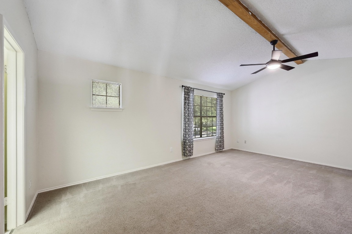 7201 Pine Bluffs Trail Austin, TX 78729 - Photo 17 of 25 an empty room with windows
