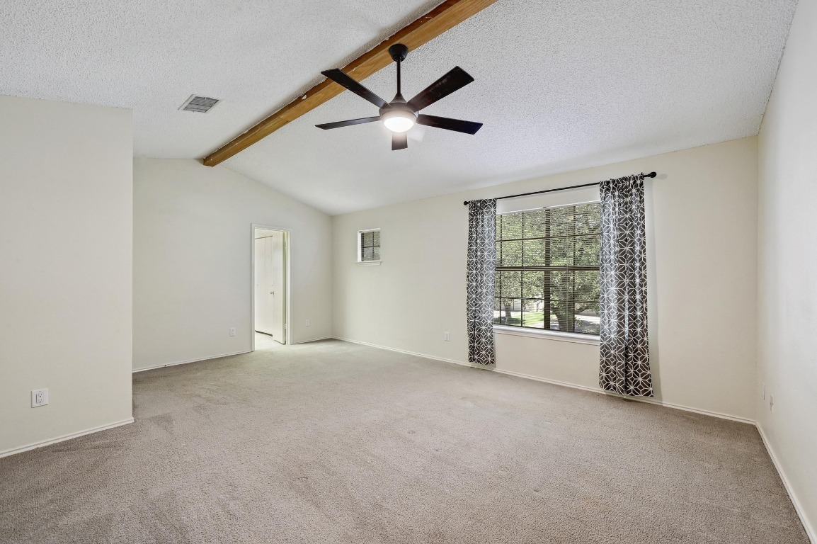 7201 Pine Bluffs Trail Austin, TX 78729 - Photo 18 of 25 a view of an empty room with a window