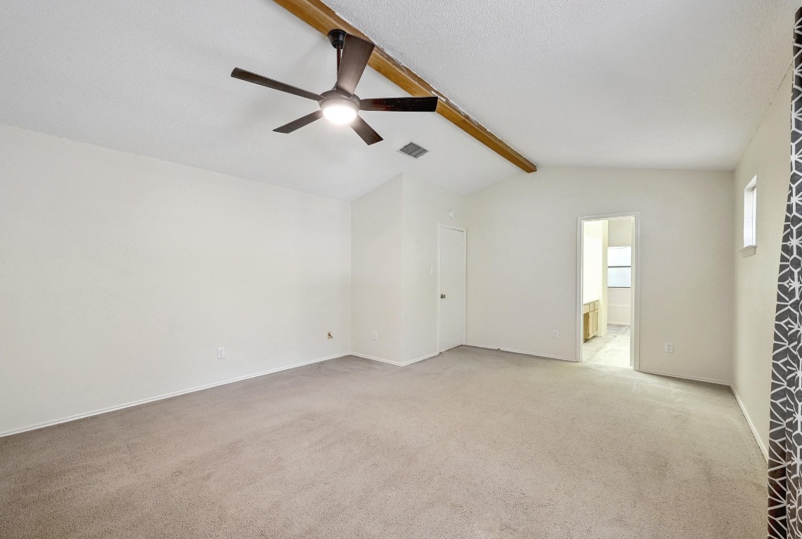 7201 Pine Bluffs Trail Austin, TX 78729 - Photo 19 of 25 a view of an empty room with a window