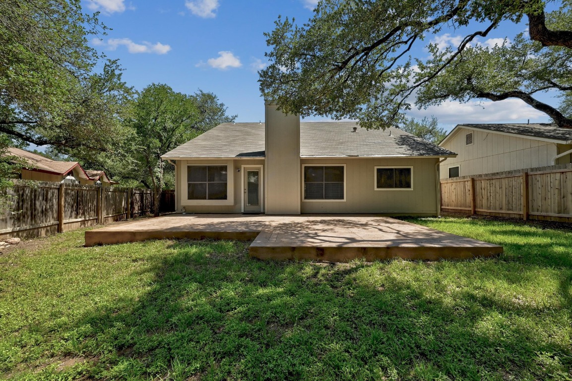 7201 Pine Bluffs Trail Austin, TX 78729 - Photo 23 of 25 a front view of house with yard and green space