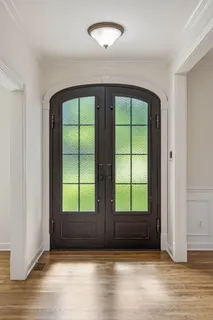 an empty room with large window