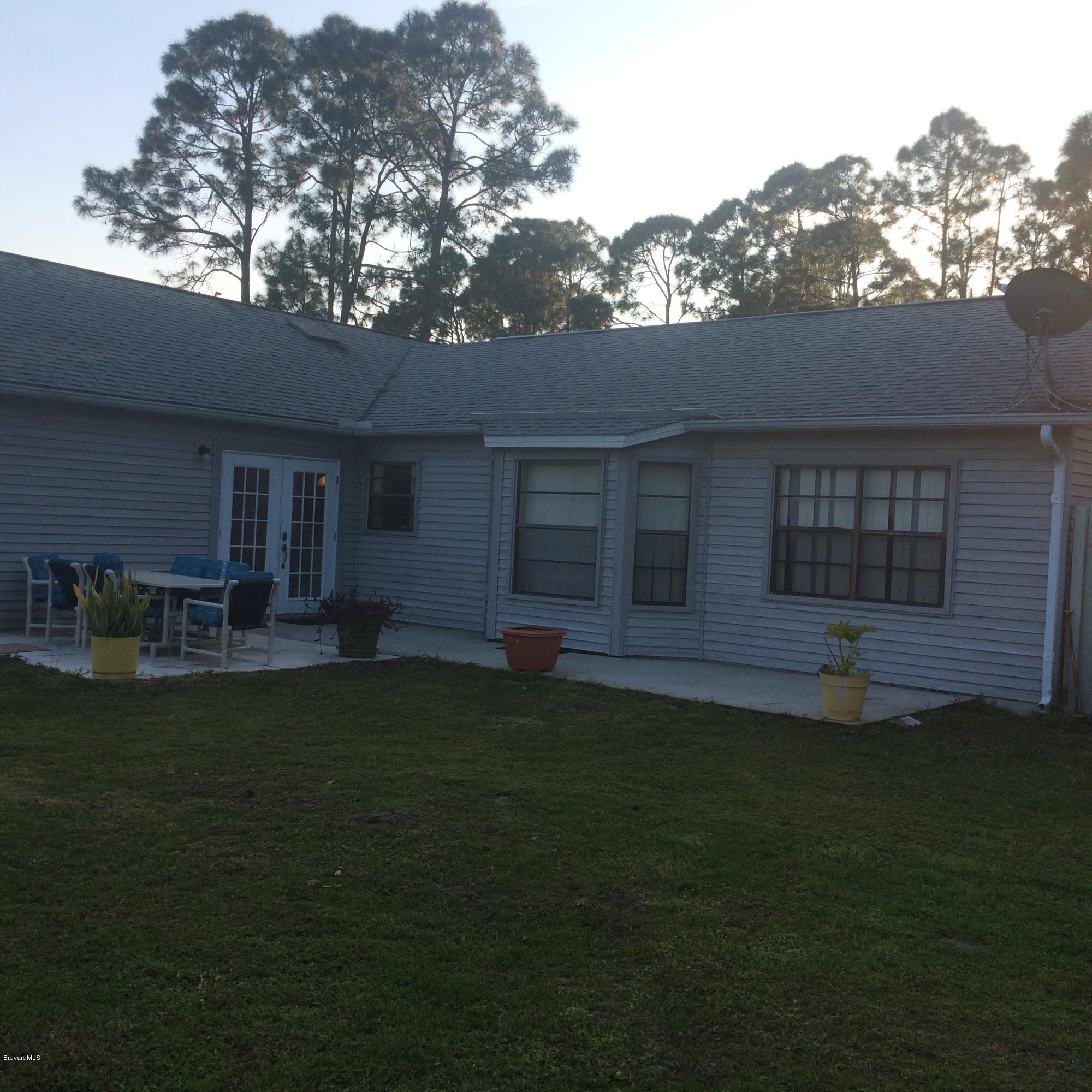 1749 Tharp Road Palm Bay, FL 32909 - Photo 4 of 34 View back of the home