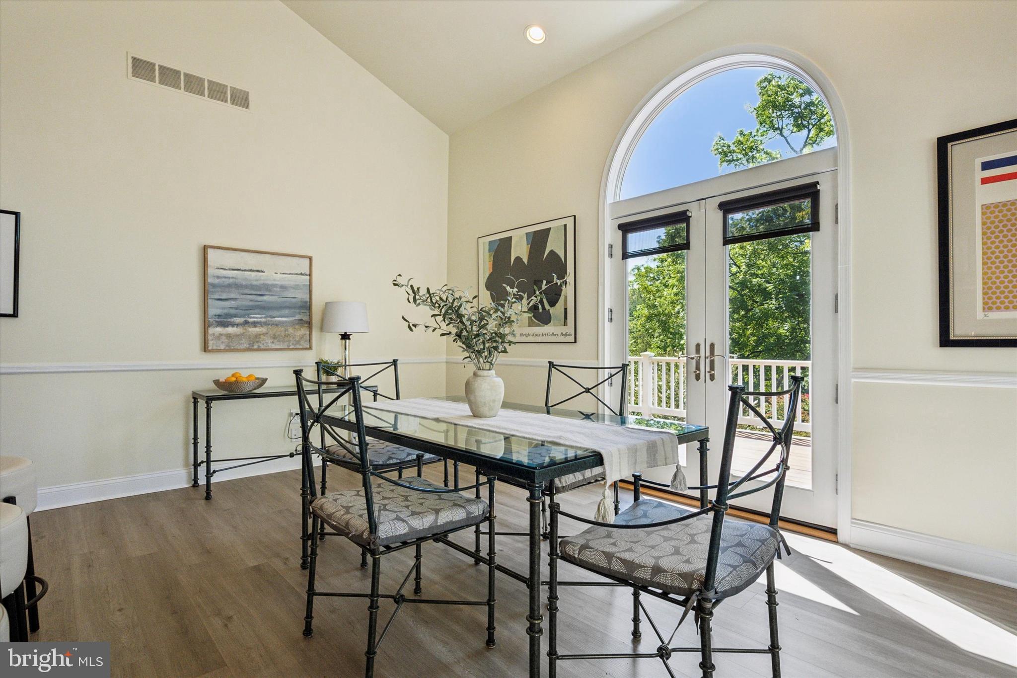 241 Painter Road Media, PA 19063 - Photo 21 of 44 a view of a dining room with furniture large window and wooden floor