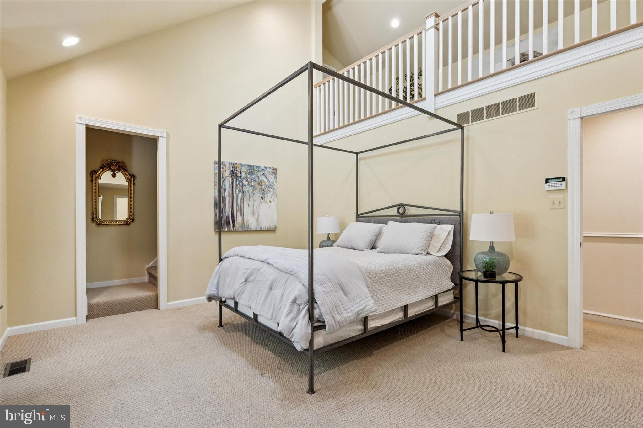 241 Painter Road Media, PA 19063 - Photo 22 of 44 a bedroom with a bed and painting on the wall