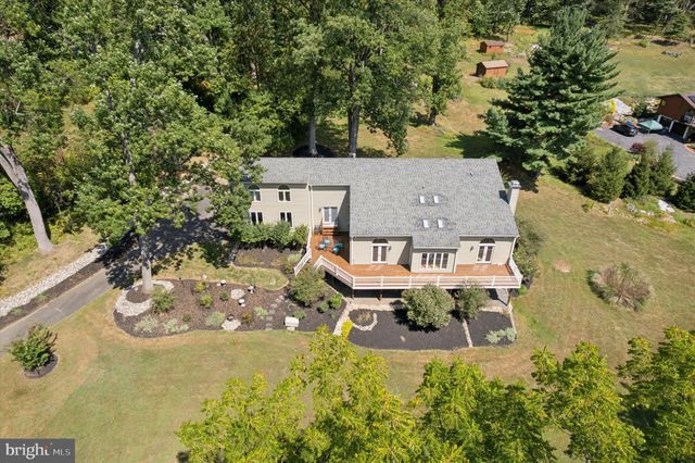 an aerial view of residential house with outdoor space
