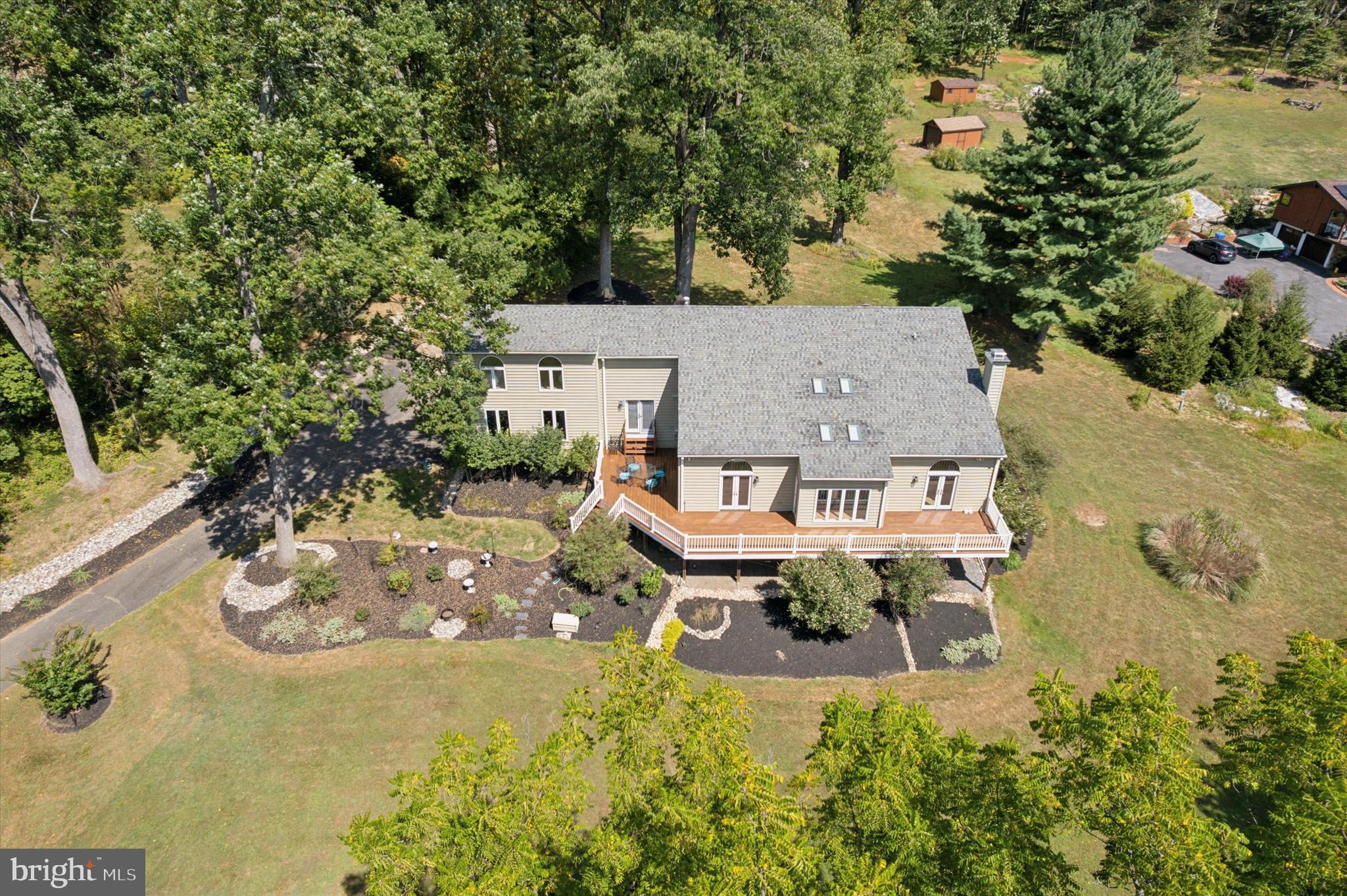 241 Painter Road Media, PA 19063 - Photo 38 of 44 an aerial view of a house with swimming pool and garden