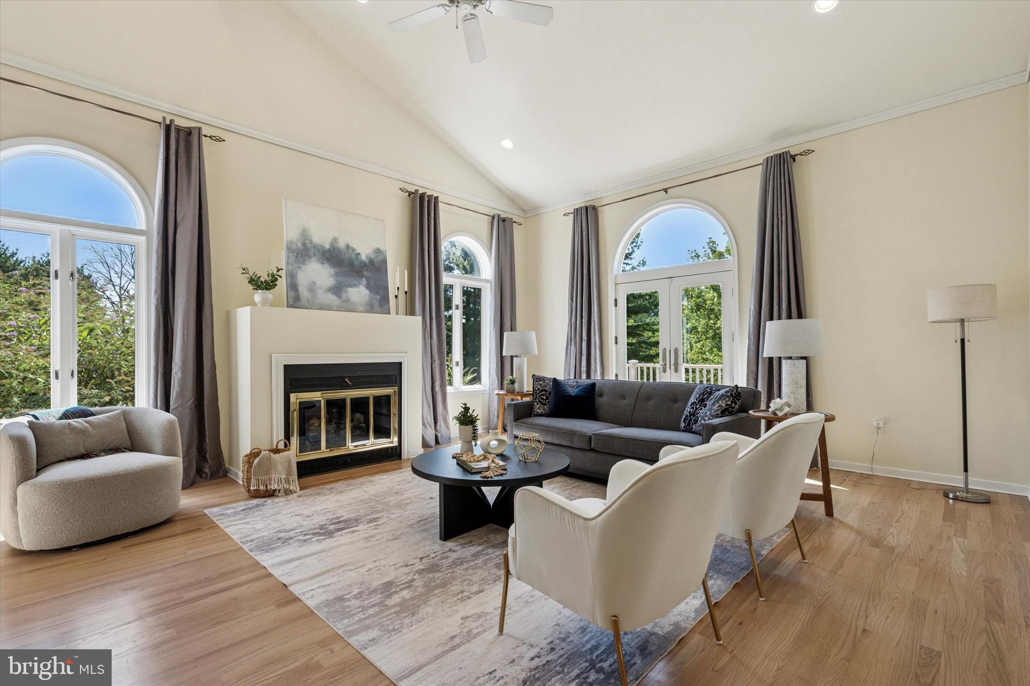 241 Painter Road Media, PA 19063 - Photo 4 of 44 a living room with furniture and a fireplace