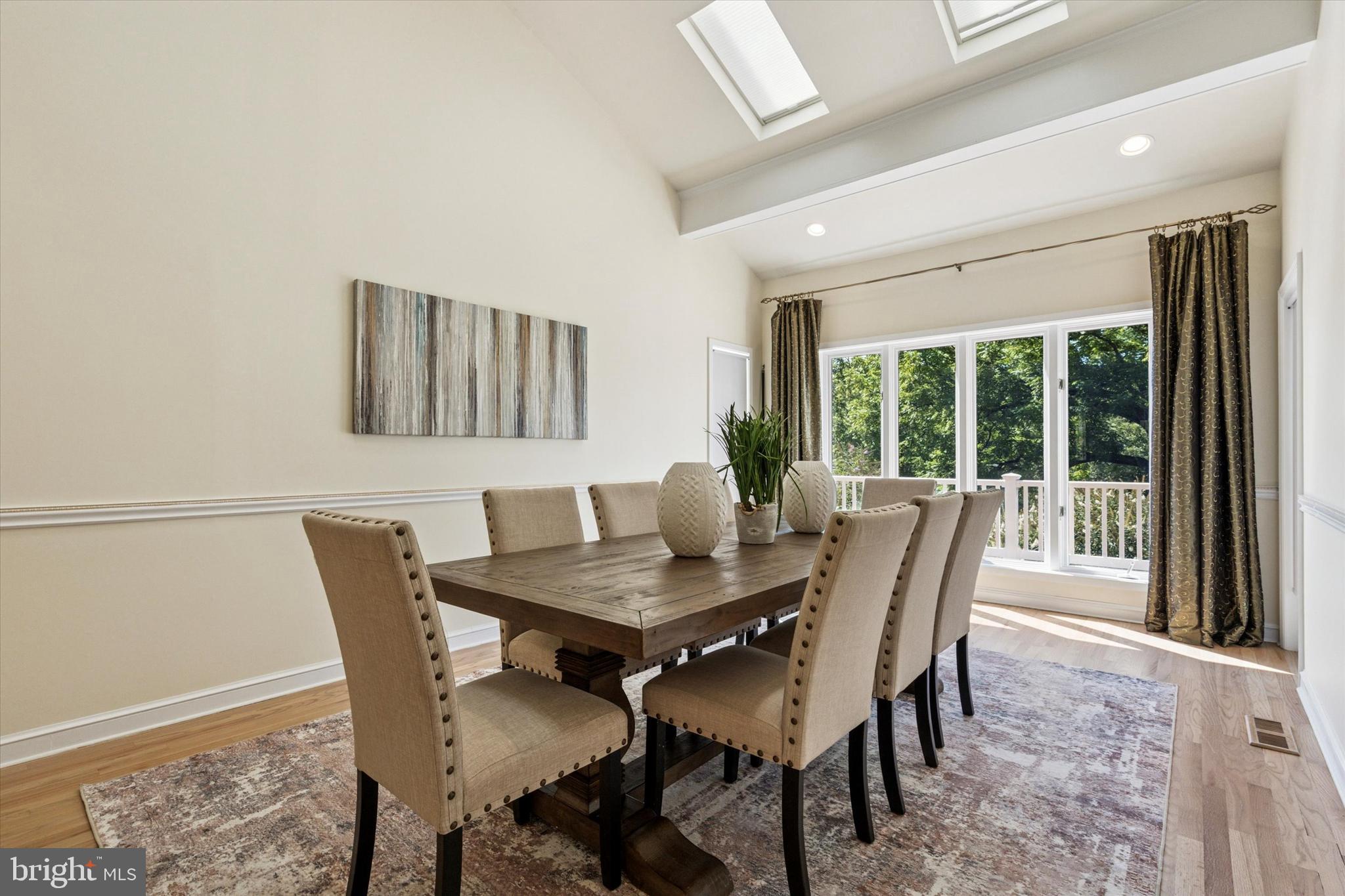 241 Painter Road Media, PA 19063 - Photo 8 of 44 a view of a dining room with furniture and wooden floor
