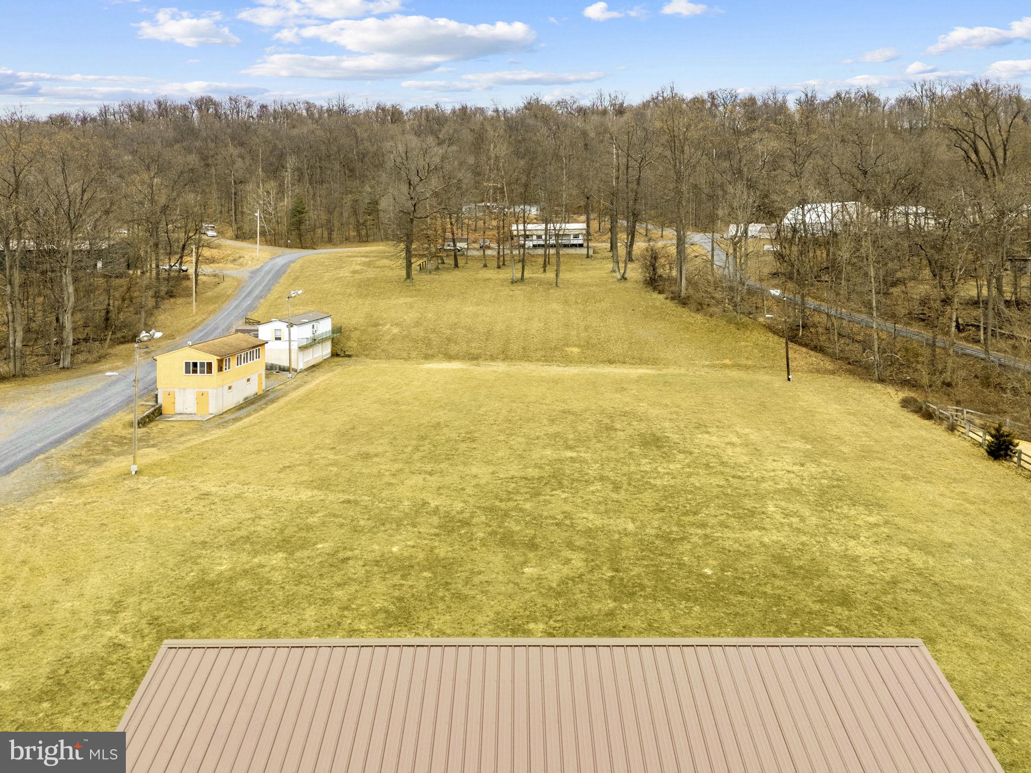 303 Barbeque Drive Berkeley Springs, WV 25411 - Photo 13 of 68 a view of a swimming pool with an ocean view