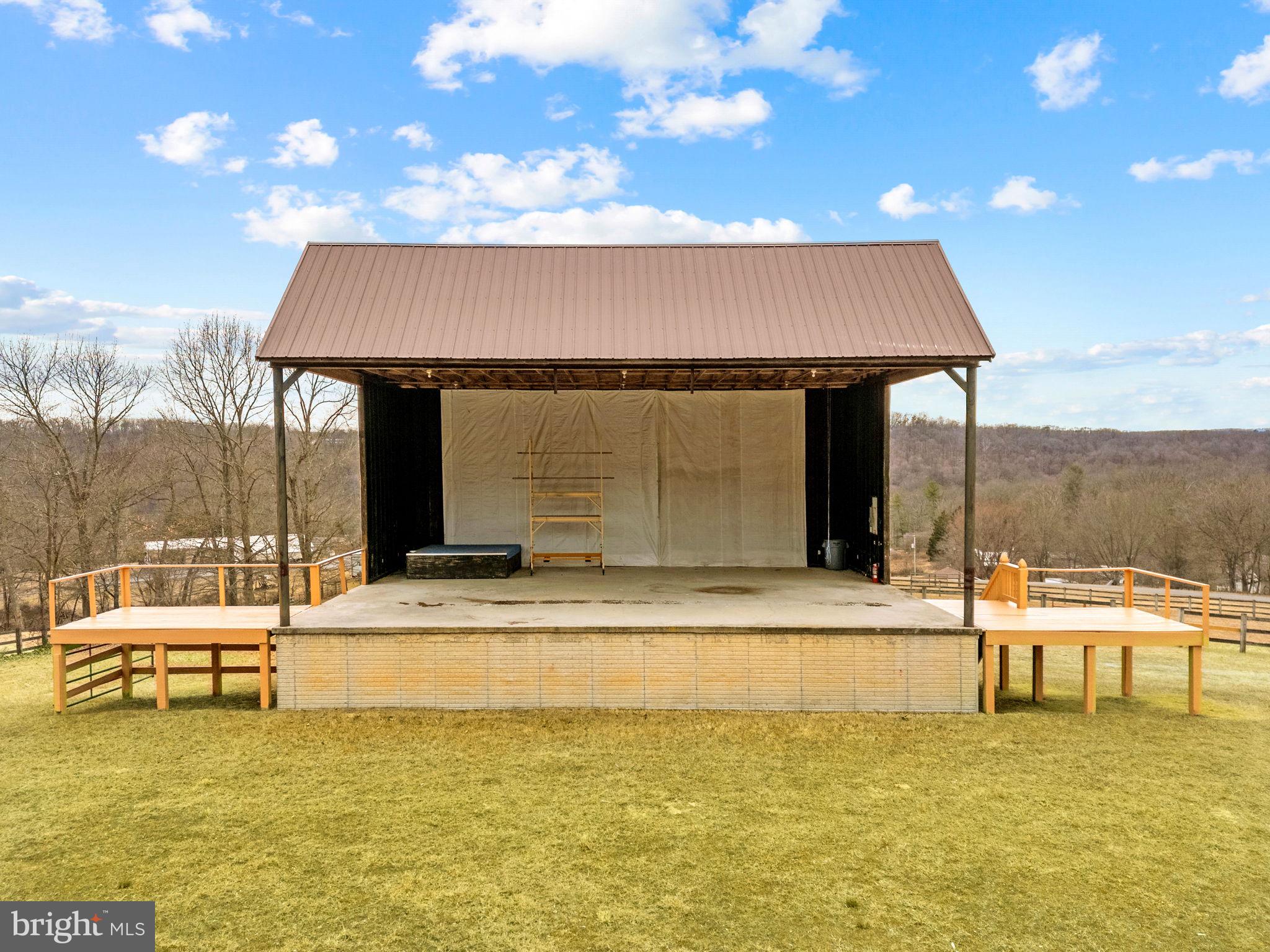 303 Barbeque Drive Berkeley Springs, WV 25411 - Photo 24 of 68 a outdoor space with swimming pool and furniture