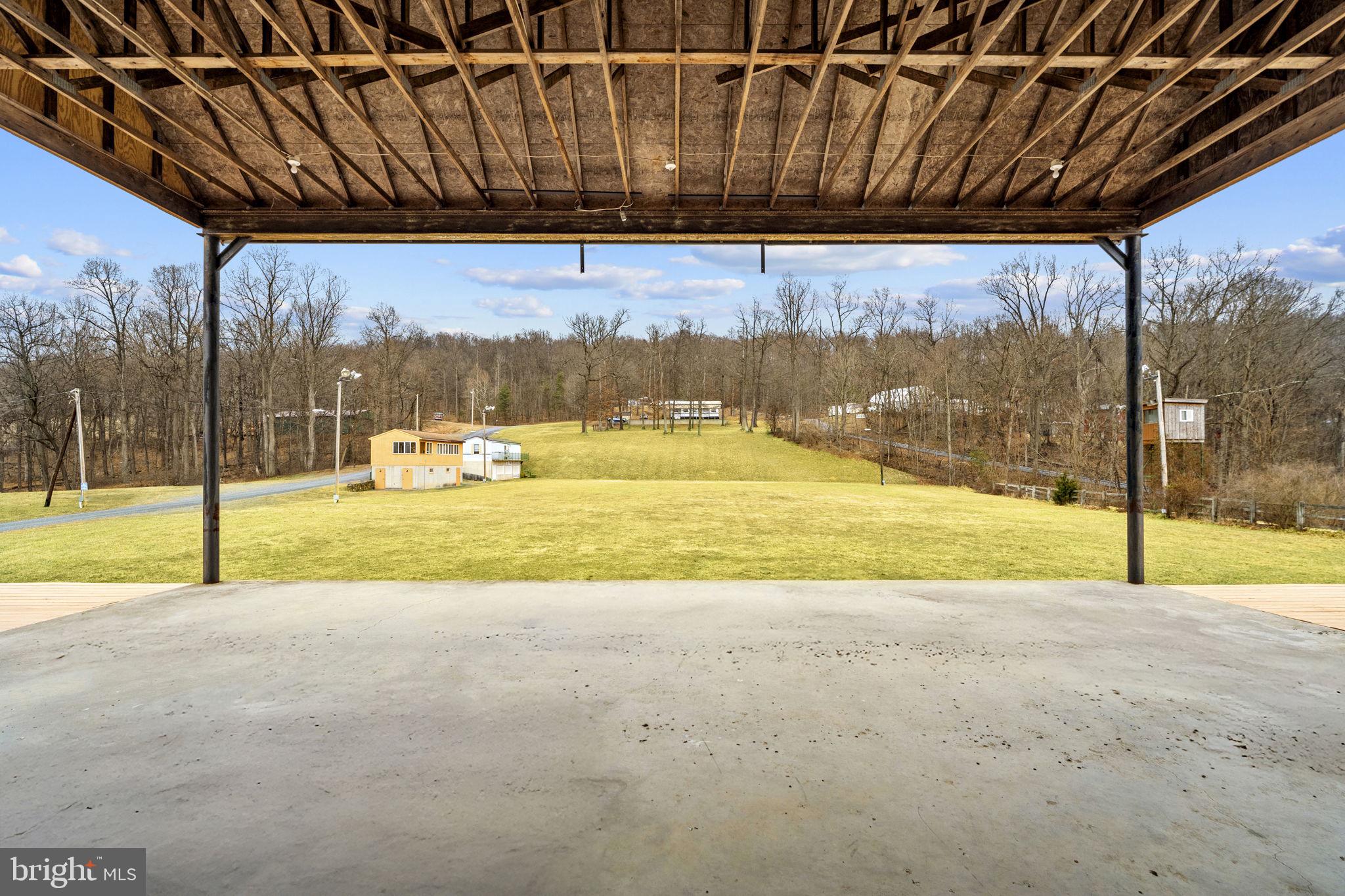 303 Barbeque Drive Berkeley Springs, WV 25411 - Photo 30 of 68 a view of swimming pool with an outdoor seating
