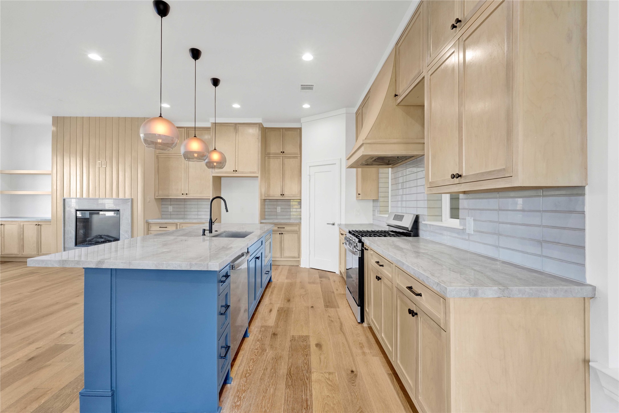 5439 Darling Street Houston, TX 77007 - Photo 15 of 42 The kitchen features custom-built cabinets, Taj Mahal countertops, ample storage, and a walk-in pantry.