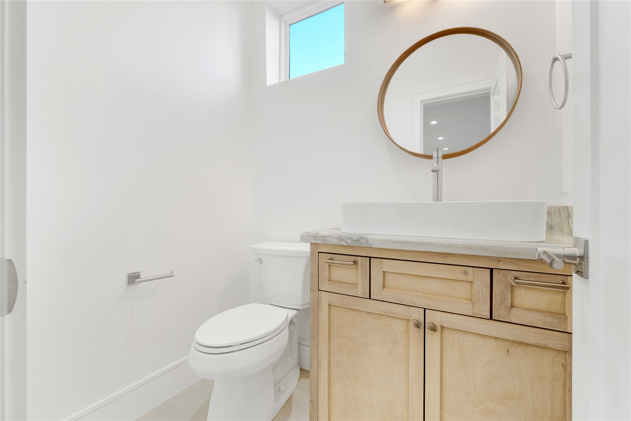 5439 Darling Street Houston, TX 77007 - Photo 21 of 42 Half bath with custom builds on the second floor.