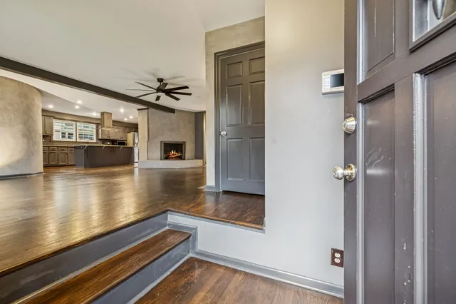 a lobby with furniture and a table