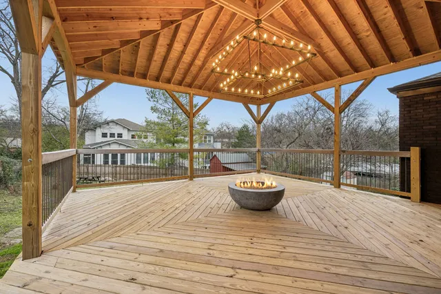 an aerial view of residential house with outdoor space