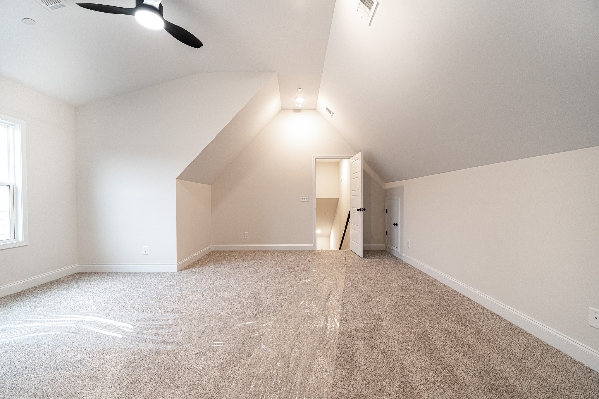 238 Franklin Street Pleasant View, TN 37146 - Photo 16 of 27 an empty room with windows and fan