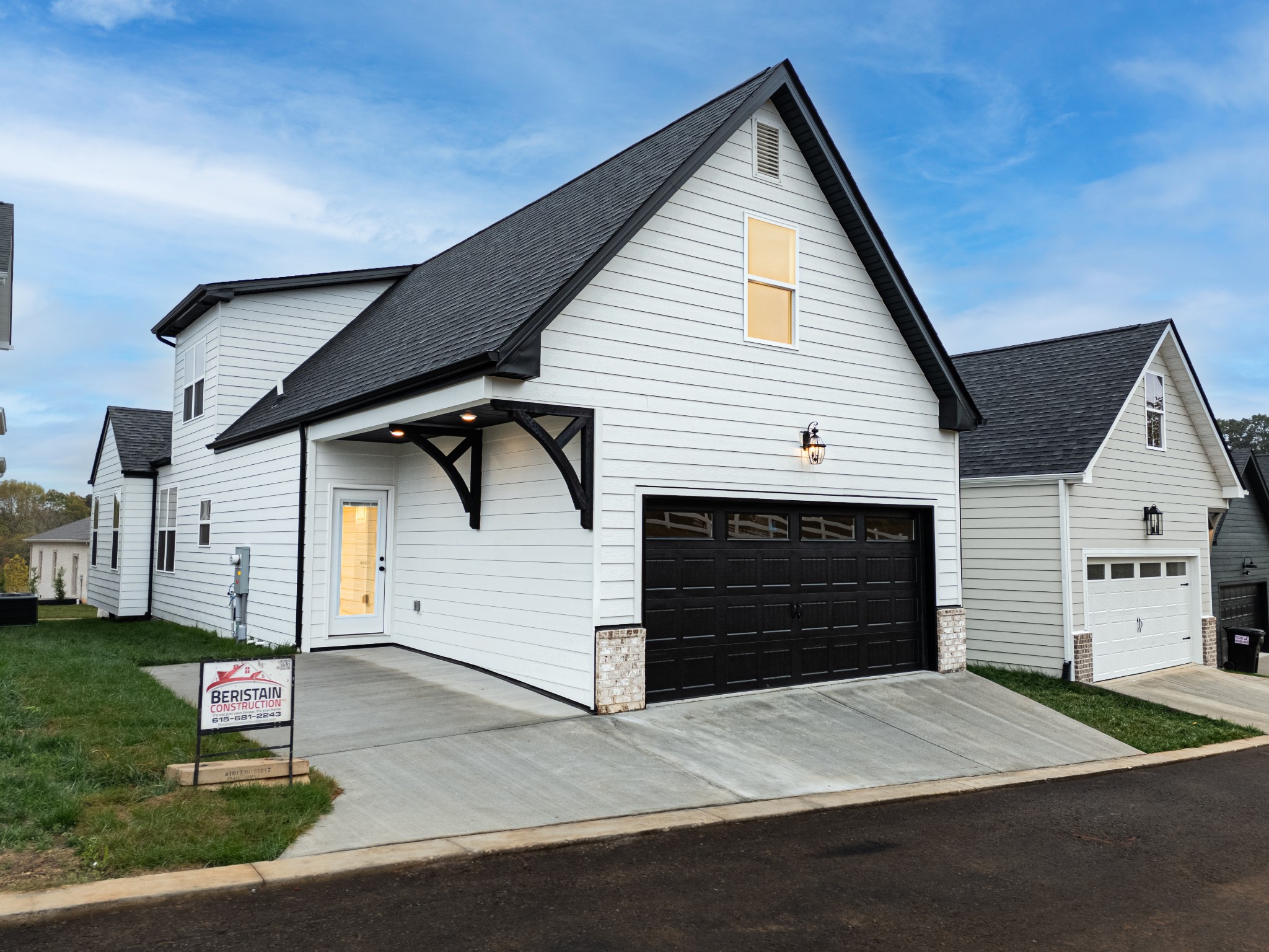 238 Franklin Street Pleasant View, TN 37146 - Photo 19 of 27 a front view of a house with a garage