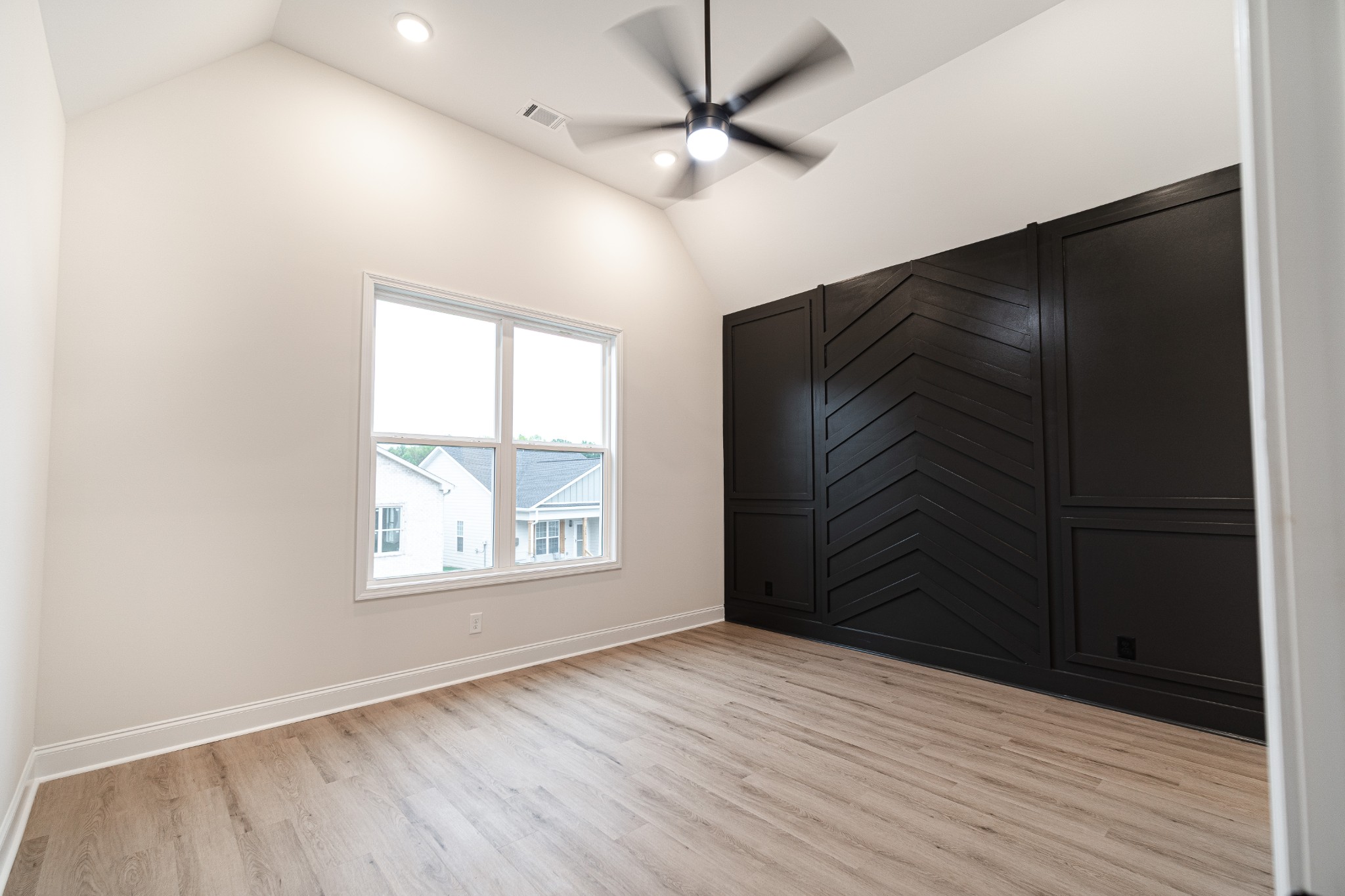 238 Franklin Street Pleasant View, TN 37146 - Photo 6 of 27 an empty room with wooden floor closet and windows