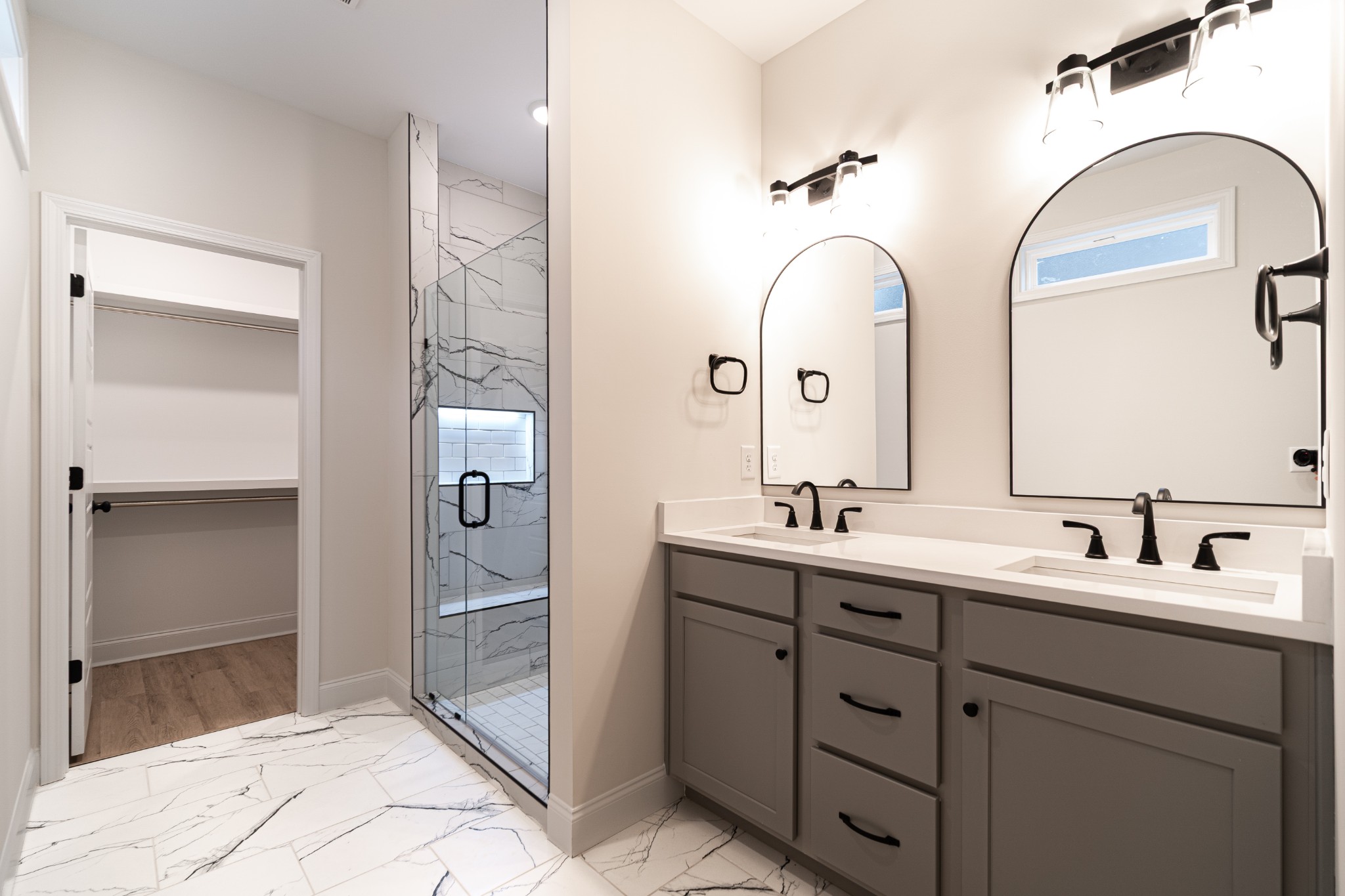 238 Franklin Street Pleasant View, TN 37146 - Photo 9 of 27 a bathroom with a double vanity sink and mirror