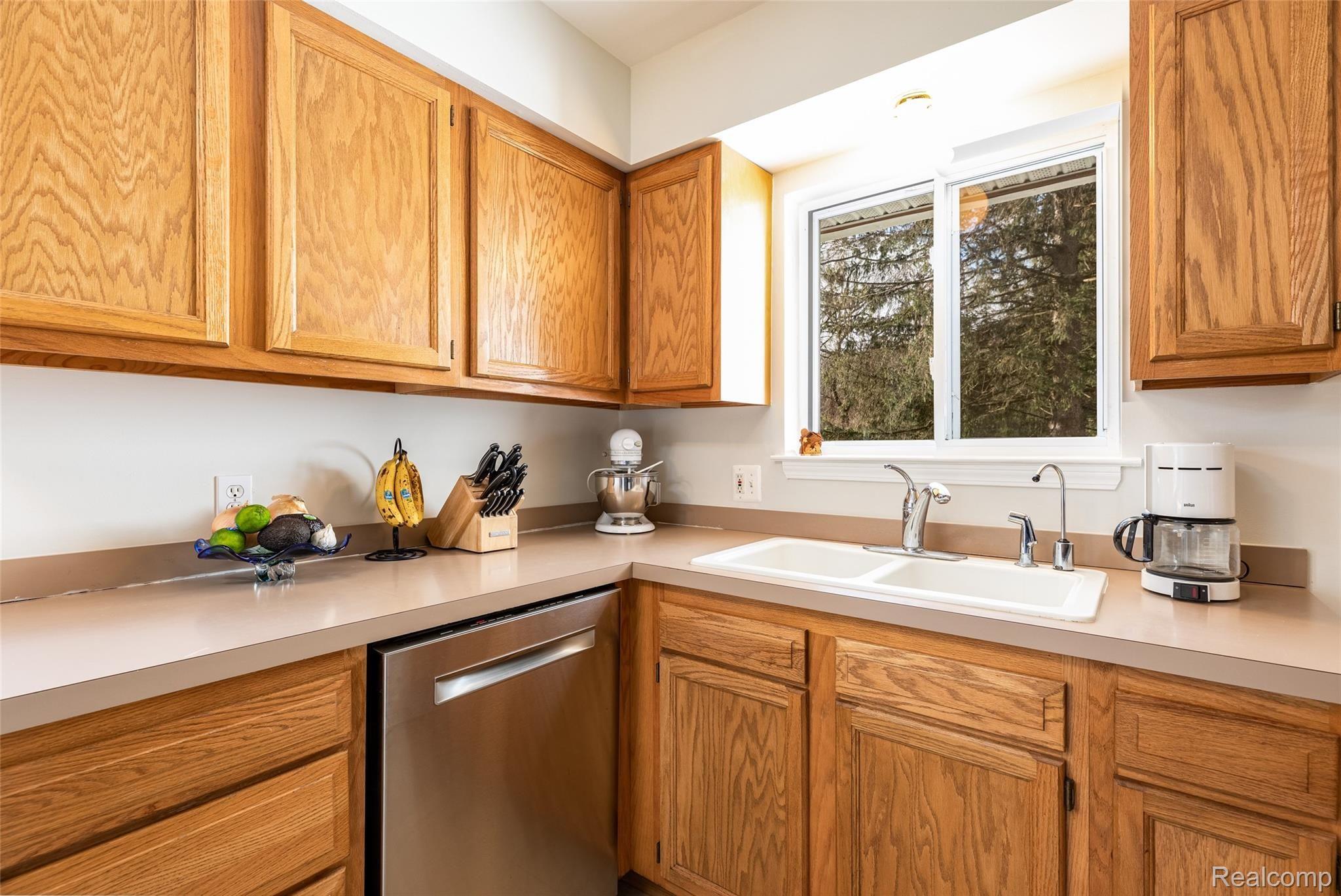 5911 Bullard Road Fenton, MI 48430 - Photo 23 of 36 Sink overlooks yard for wildlife viewing