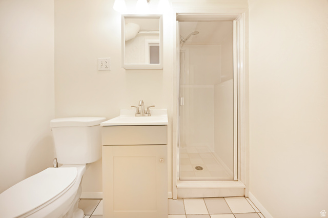 250 West 100 North Logan, UT 84321 - Photo 31 of 41 Bathroom with a stall shower