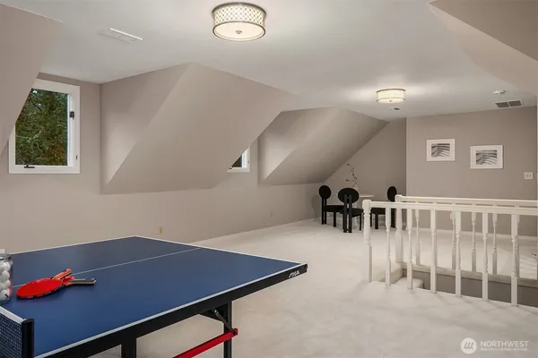 a room with furniture and white walls