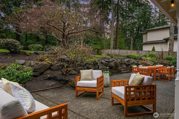 a view of a yard with patio