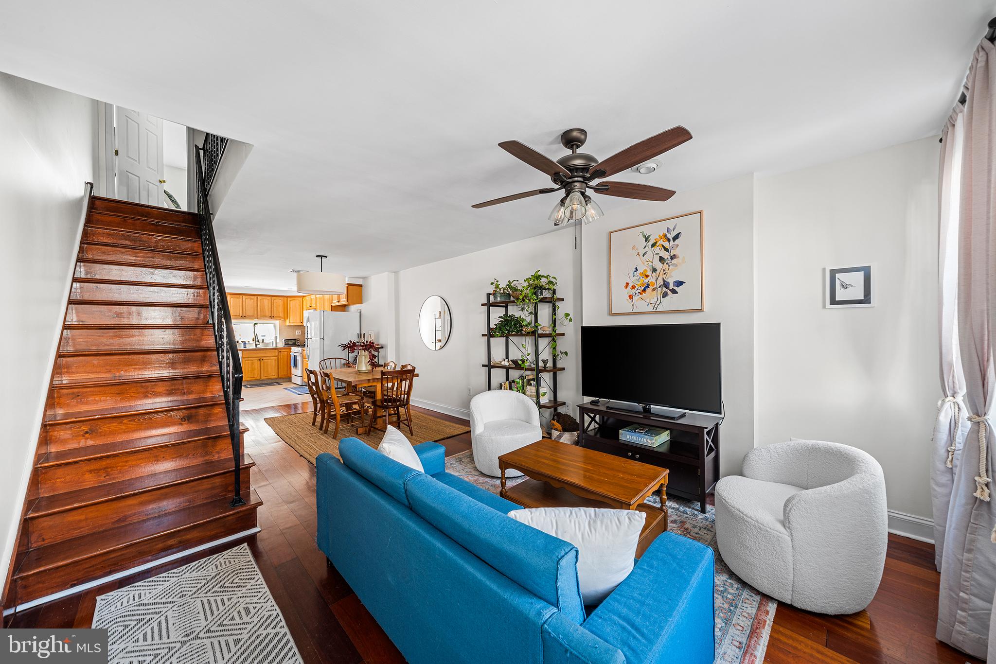 2520 Webster Street Philadelphia, PA 19146 - Photo 3 of 24 a living room with furniture and a flat screen tv