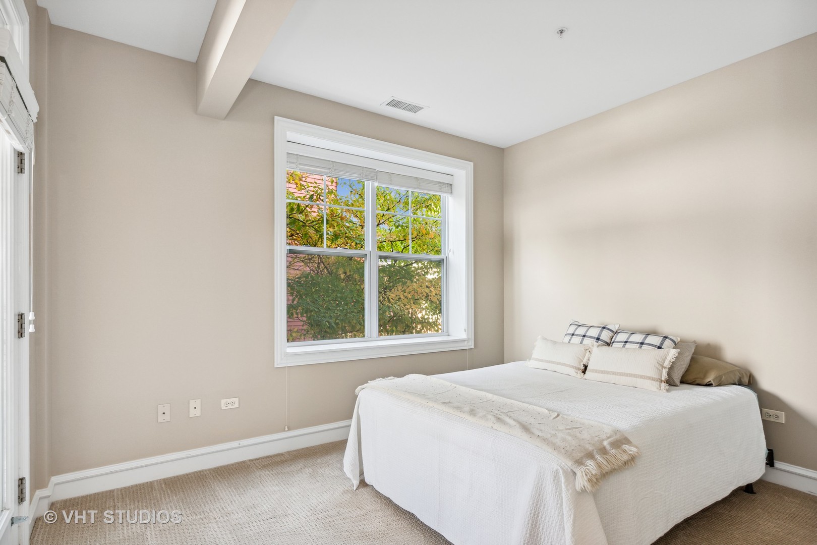 977 Harris Road, Unit 11 Grayslake, IL 60030 - Photo 13 of 30 a bedroom with a bed and a window