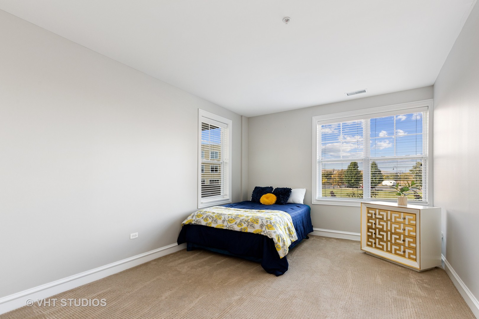 977 Harris Road, Unit 11 Grayslake, IL 60030 - Photo 14 of 30 a bedroom with a bed and a window