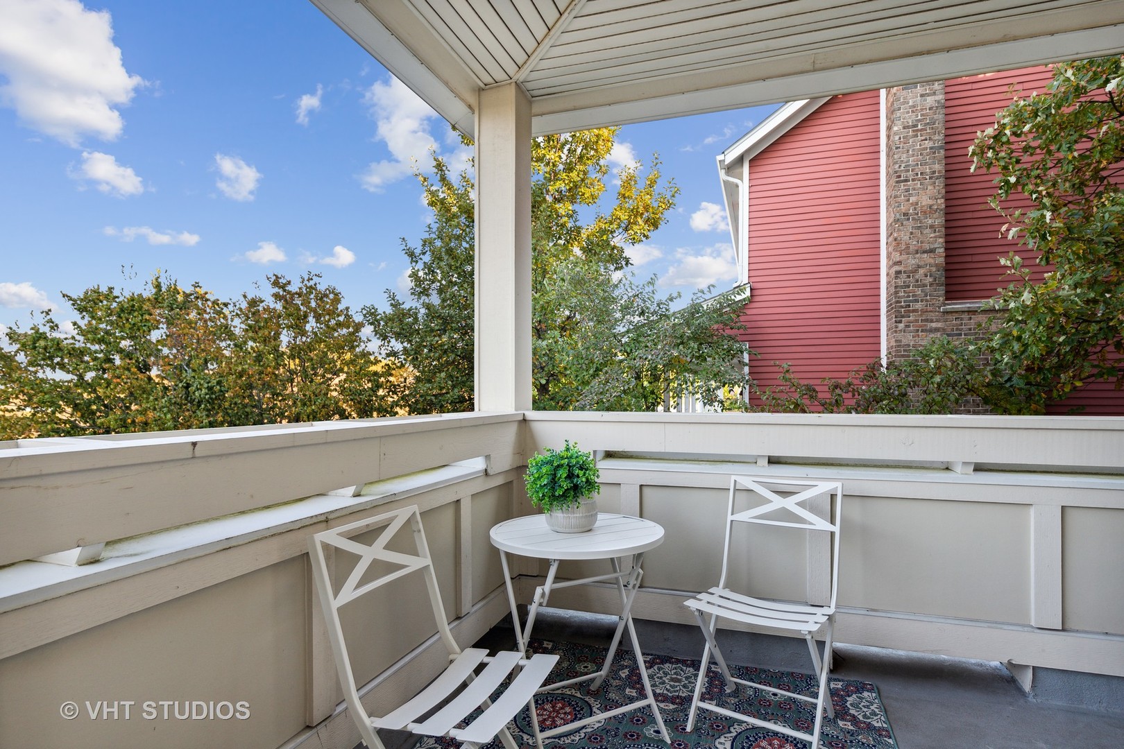 977 Harris Road, Unit 11 Grayslake, IL 60030 - Photo 17 of 30 a view of a patio with table and chairs and potted plants