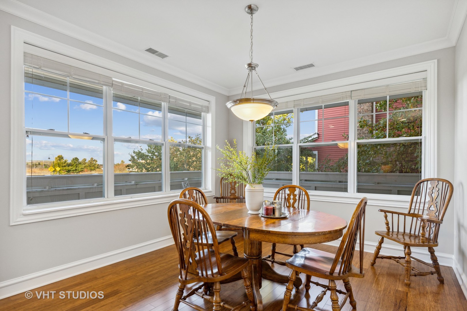977 Harris Road, Unit 11 Grayslake, IL 60030 - Photo 5 of 30 a view of a dining room with furniture window and outside view